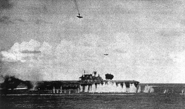 Image of 'Burning bomber dives on Hornet.'