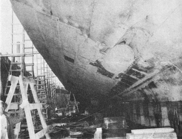Photo 9: RENO (CL 96) Looking forward at after end of replacement plating. Note watertight seal on port stern tube.