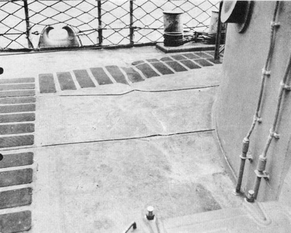Photo 35: O'BRIEN (DD 415) Wrinkles in forecastle deck frame 37, starboard, caused by flexural vibration resulting from torpedo detonation near bow.