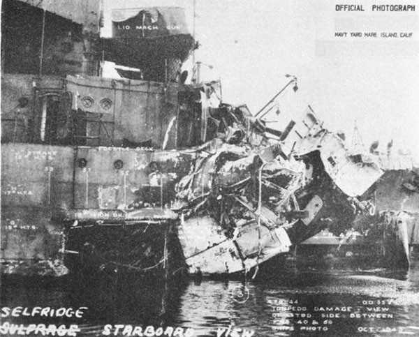 Photo 58: SELFRIDGE (DD 357) Starboard side view of torpedo damage. Shell plating below main deck carried away as bow tore off.