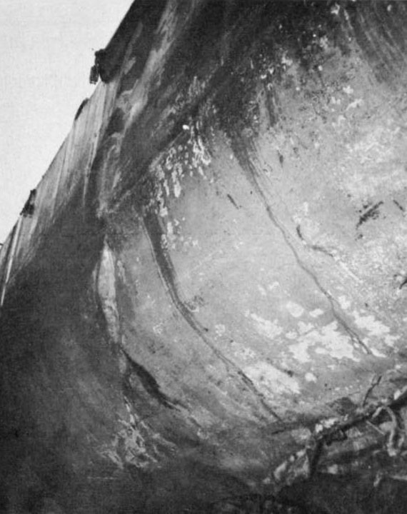 Photo 67: FOOTE (DD 511) Wrinkles in shell plating frame 163, port. Damaged plating in way of port shaft can be seen at lower right corner. Note external longitudinal stiffener on sheer strake installed at Purvis Bay.