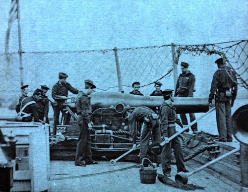Image from cover - showing sailors manning a gun.