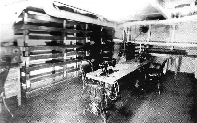 Image of Linen Repair and Marking Room aboard USS Relief, 1921. 