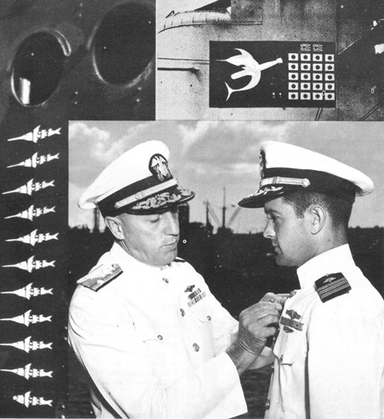 Commander Montross receiving Navy Unit Commendation.