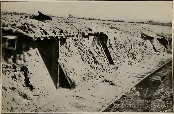 DUGOUTS USED BY NAVAL BATTERY CREWS.