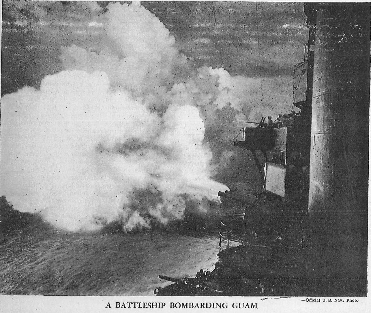 A battleship bombarding Guam