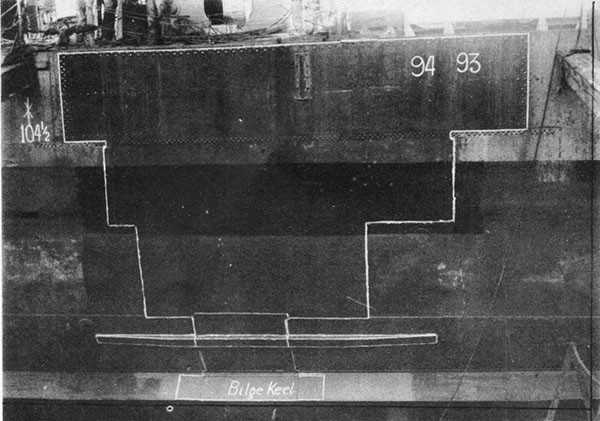 MAYRANT (DD402). Starboard shell amidships after temporary repairs at Malta. Note extent of repairs compared with extent of buckling shown in Photo 7-6.