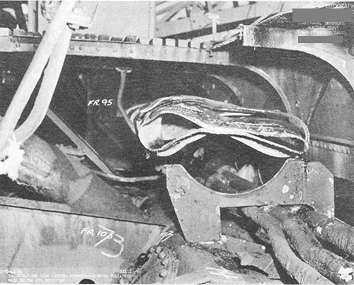 Photo 7-6: SALMON (SS182). View showing portion of collapsed engine air induction piping in superstructure.