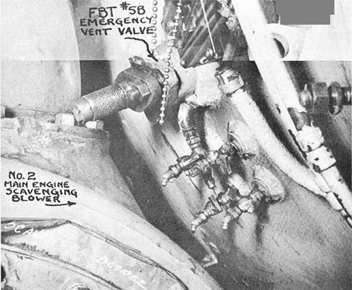 Photo 9-12: SCAMP (SS277). Close view showing displacement of FBT No. 5B emergency vent valve due to bulge in pressure hull.