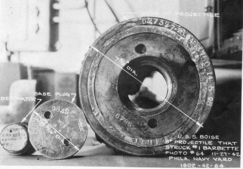 Photo 13: Portions of base of projectile. Markings and design features indicate English manufacture.