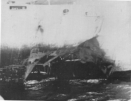Photo 16: Torpedo damage to starboard shell U.S.S. ALHENA upon arrival in port.