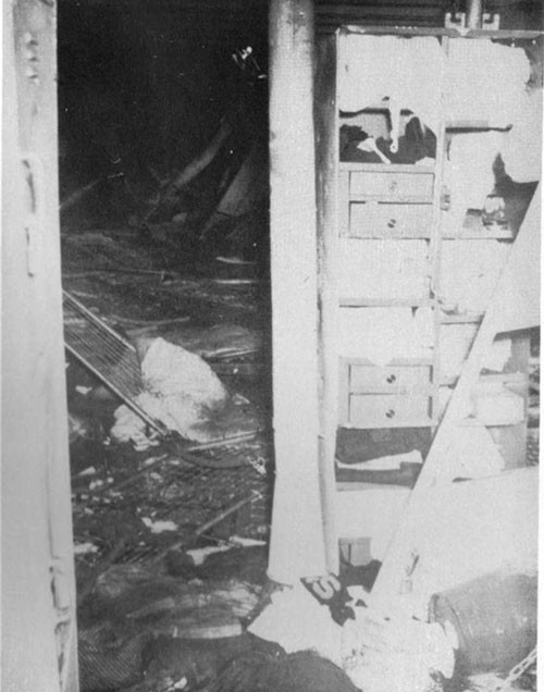 Photo 27: Crew's quarters port side second deck, looking forward from abreast after end of No. 5 hatch. A fire burned for 3-1/2 hours in this space. 