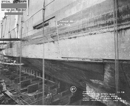 Photo 35: Temporary shell plating on starboard side installed at Pearl Harbor.
