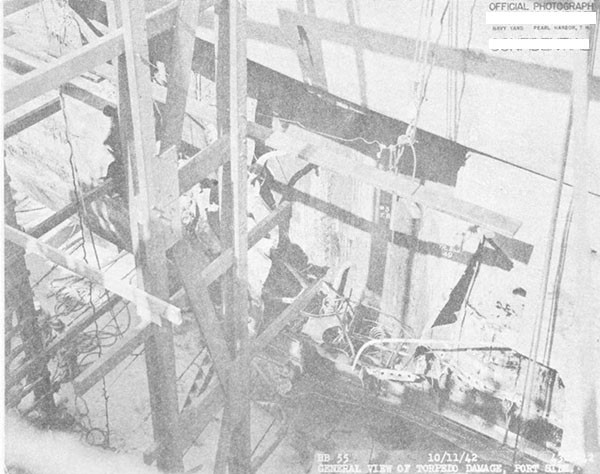 Photo 1. General view of torpedo damage, port side.
