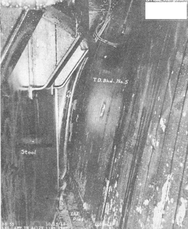 Photo 13. Note open vertical seam at frame 45 in torpedo protection bulkhead No. 5. View looking aft in A-412V on first platform deck.