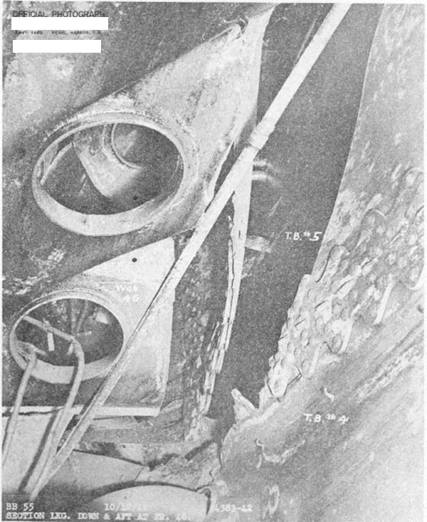 Photo 5. Torn scarph in torpedo protection bulkhead No. 4.