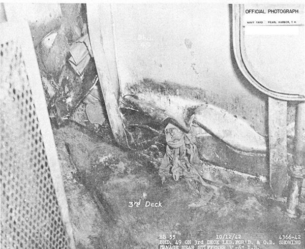 Photo 42. Damage to bulkhead 49 and to third deck in A-324A.