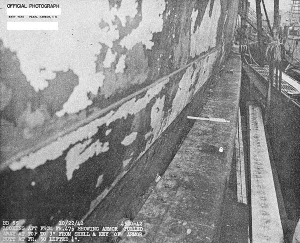 Photo 7. Top of side armor belt, looking aft. Note that space between shell and side belt has opened. Concrete backing for belt has crumbled.