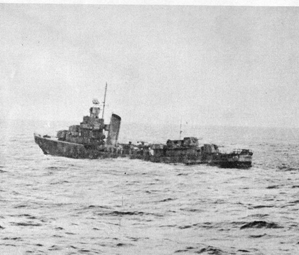 Photo 6: At 0645, 19 October, 1942. Note permanent upward set of bow.