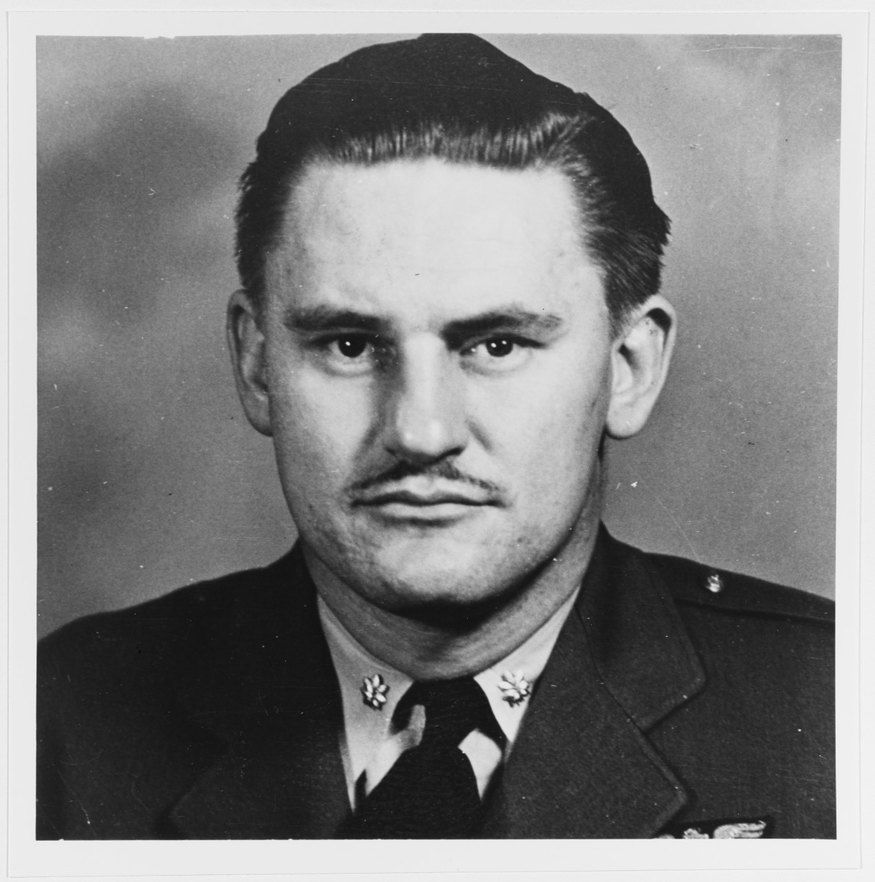 Commander Carl H. Amme Jr., USN
