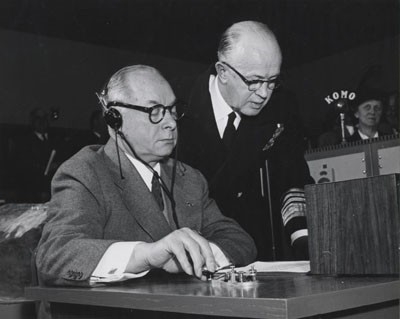 Brigadier General David Sarnoff, Chairman of the Board, Radio Corporation of America and Admiral Robert B. Carney, Chief of Naval Operations - transmit the first operational message from the world's most powerful radio transmitter, at Jim Creek, Washington, 18 November 19153. The 1,200,000 watt radio was built by RCA for the navy. Gen. Sarnoff tapped out the message as dictated by Adm. Carney.