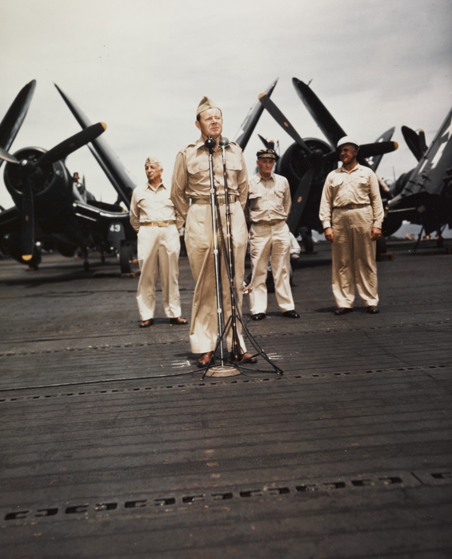 Assistant Secretary of the Navy John L. Sullivan on USS SHANGRI-LA (CV-38) 2 July 1945