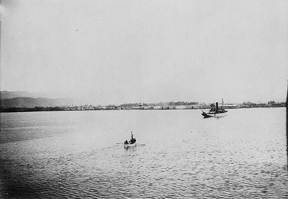 A picture of Nelson A. Miles coming to shore in a boat at Guanica, Puerto Rico on July 25, 1898.