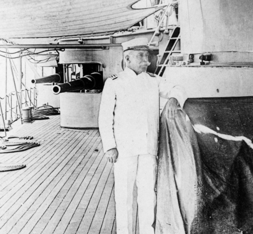 A photo of Commo. George Dewey on the deck of the U.S.S. Olympia.