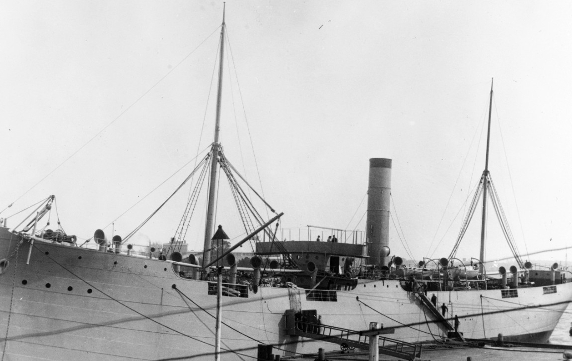 A picture of the USS Merrimac at dock.