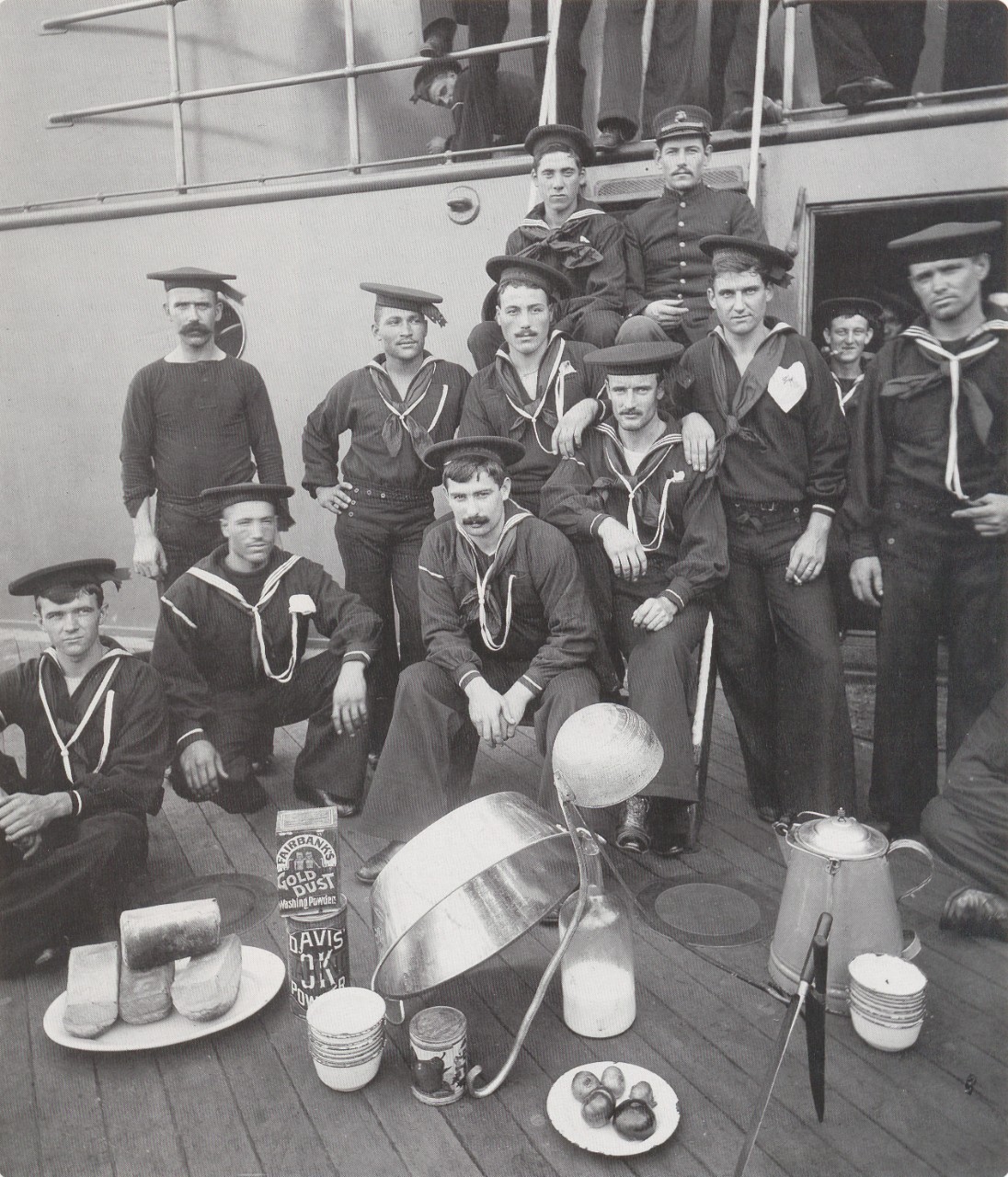 A picture of the mess crew on the deck of the USS Oregon.