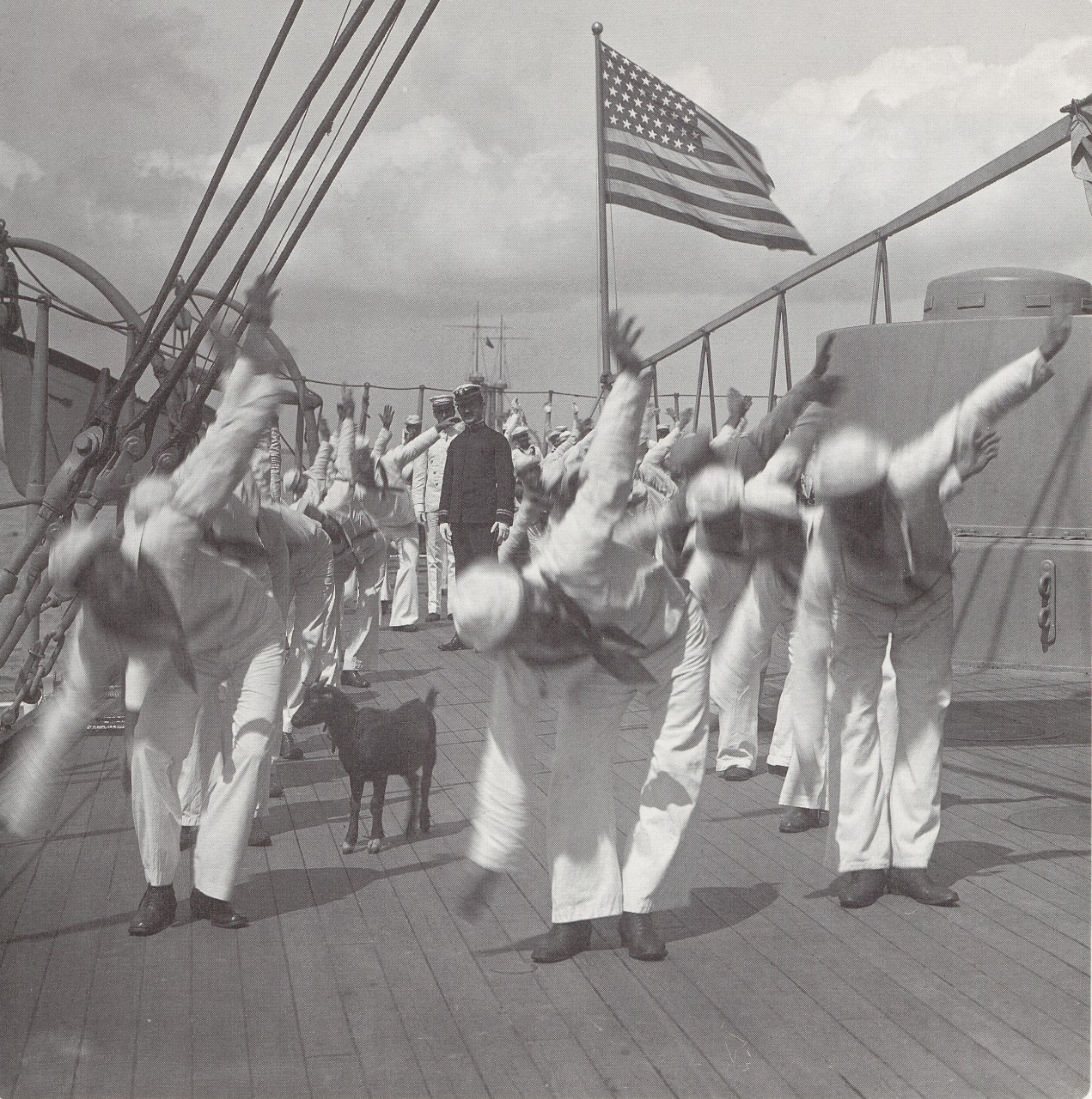 A picture of sailors exercising on the deck of the USS New York.