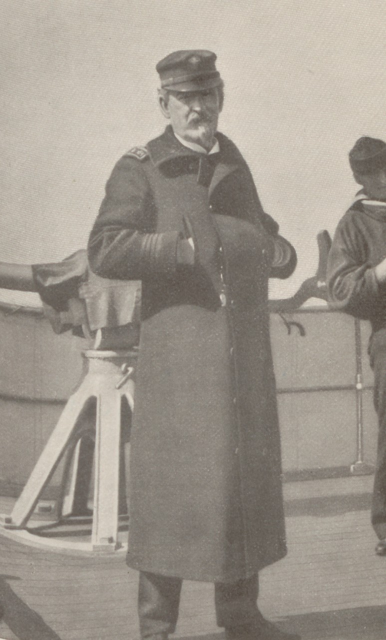 A picture of Commodore Winfield S. Schley on the deck of the USS Brooklyn.