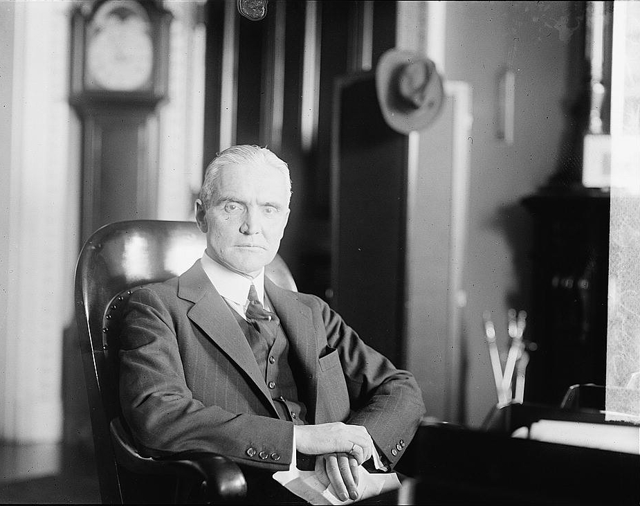 Photograph of Polk seated at his desk