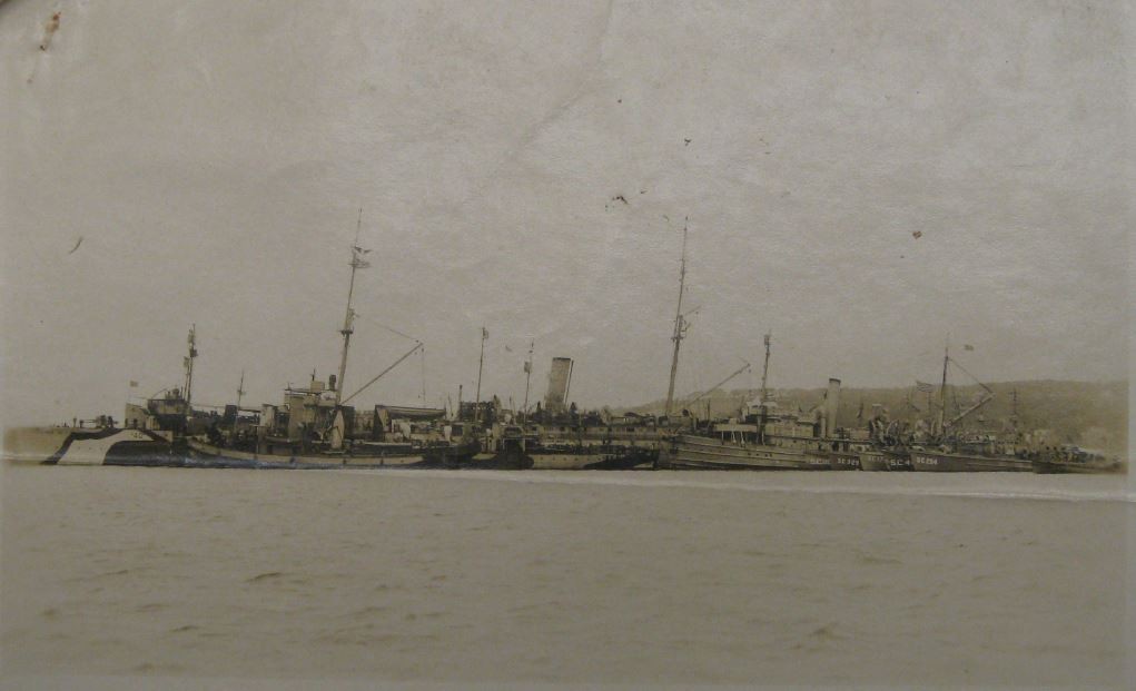 Photograph taken from the window of U.S.S. Melville showing a gathering of ships