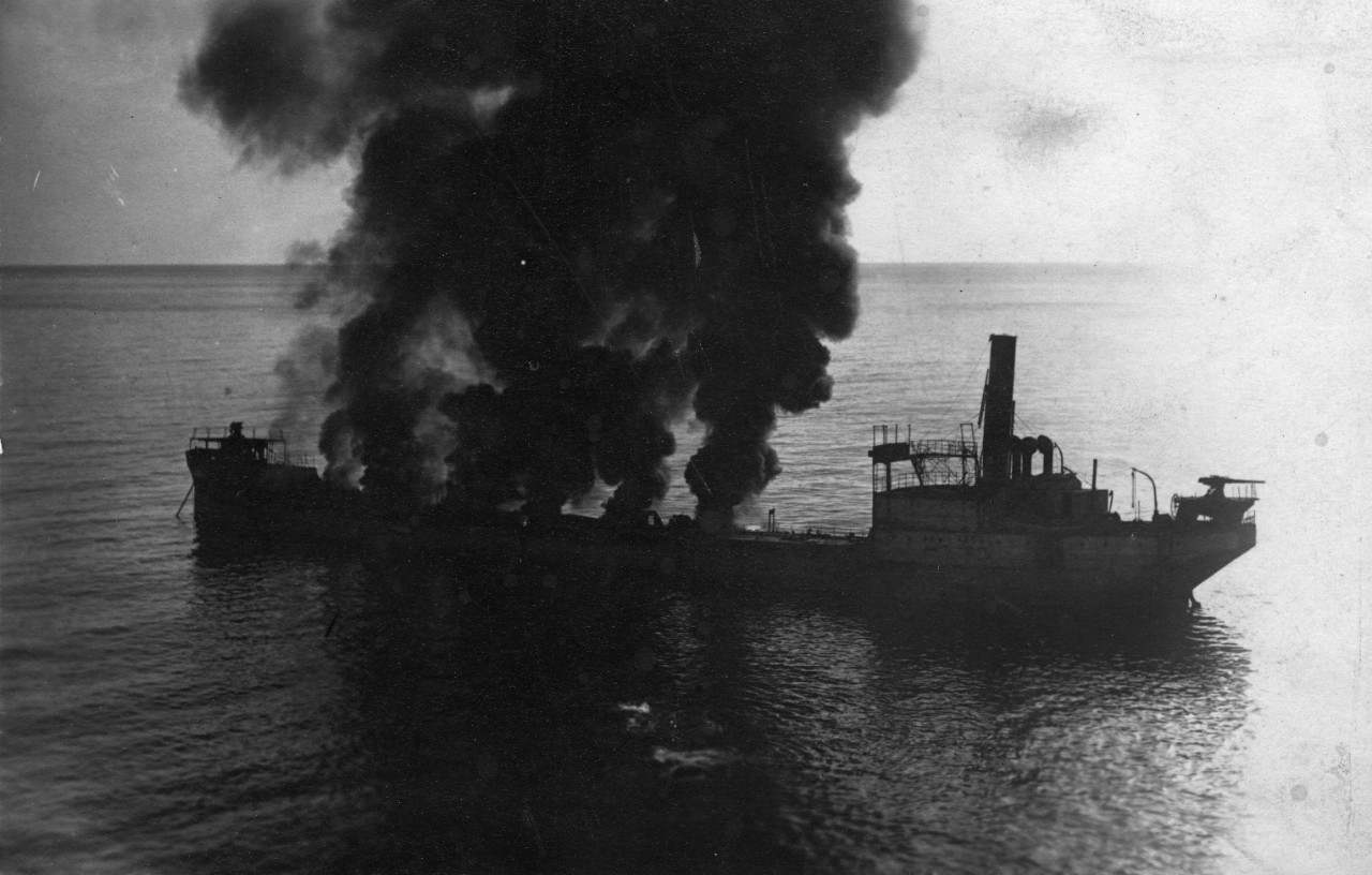 Photograph of ship in flames