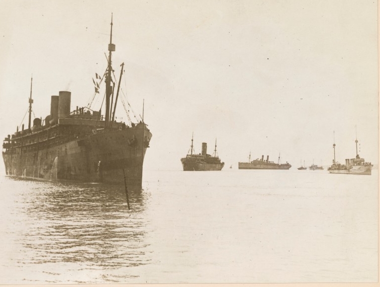 Photograph of troop transport reaching French coast