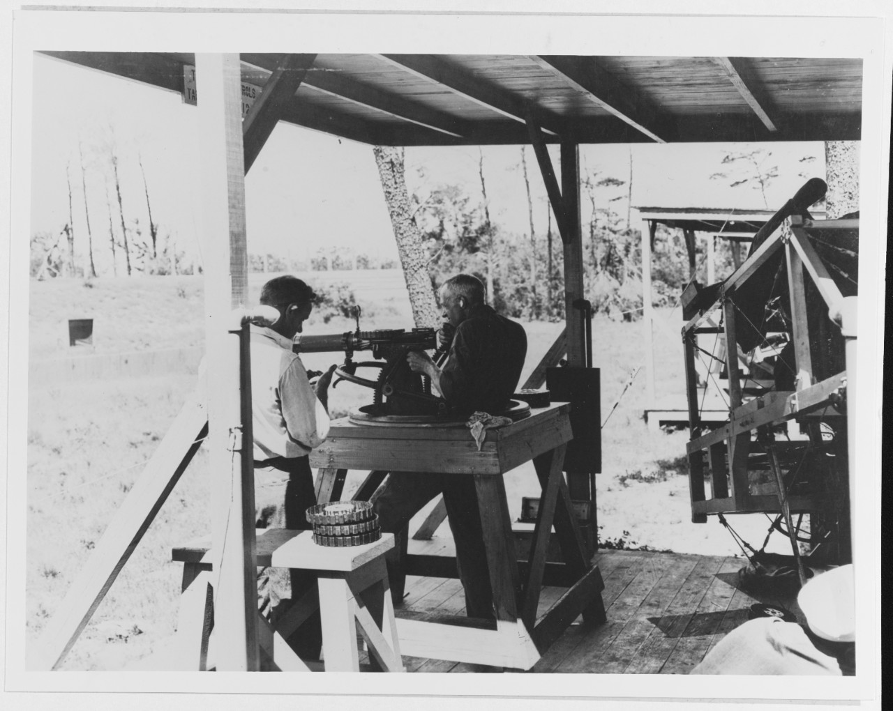 Photograph of Yarnell operating a machine gun