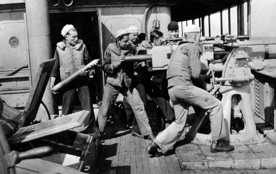 Manning the guns on USS Noma