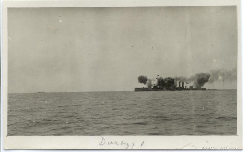 Photo of ships firing big guns