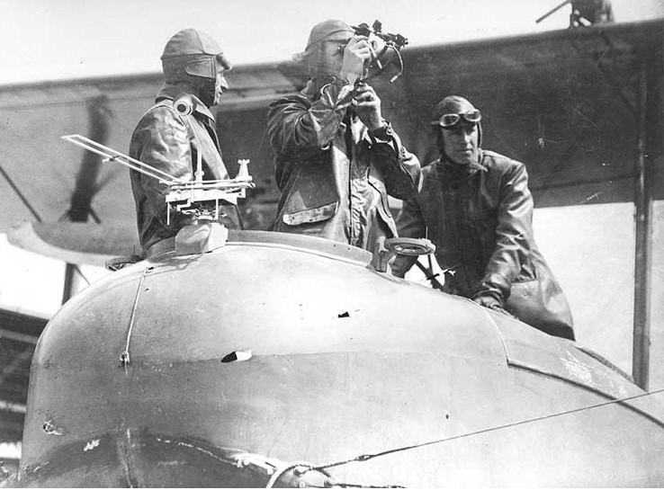 Photograph of aviators just prior to starting flight.