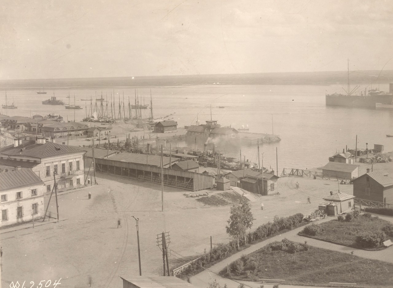 <p>First plate of panorama of the Dvina riverfront in Archangel, Russia, in July 1919, one year after the Allies’ arrival. The view is upstream in the direction of Smolney Docks and Bakharitza. Image 111-SC-62504, courtesy of the National Archives. </p>
