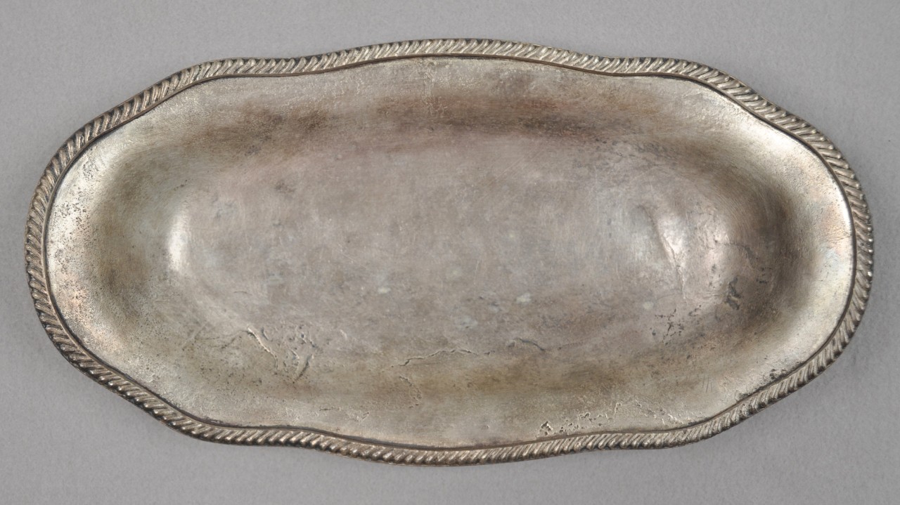 <p>Silver plated serving platter from USS San Diego with braided edges . At the top is an anchor and the letters USN.</p>
